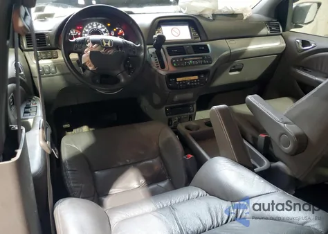 2010 Honda Odyssey Touring z USA, uszkodzony, nr VIN 5FNRL3H99AB061403